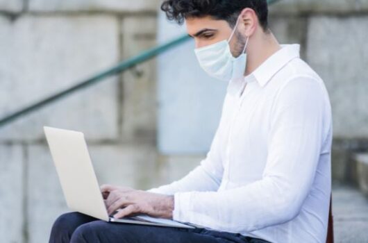business-man-using-his-laptop business-man-using-his-laptop